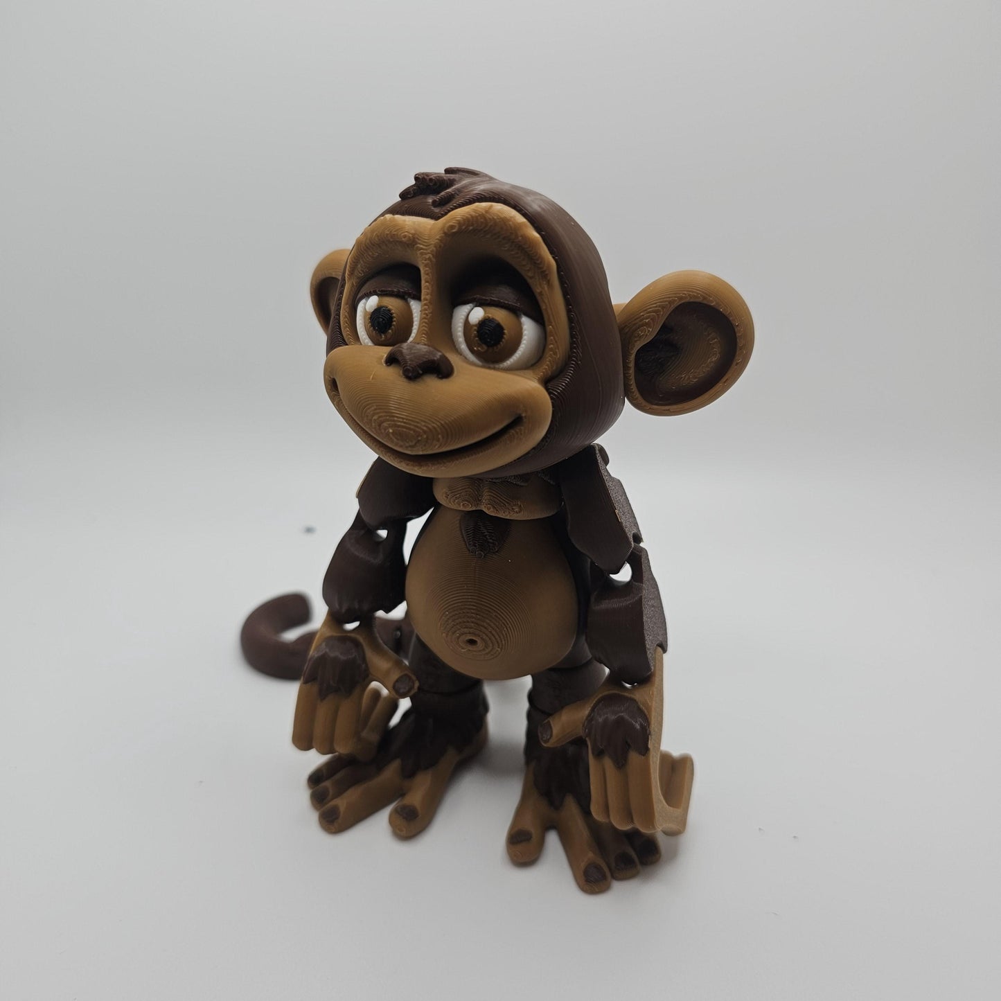 3D Printed Articulated Monkey – Hangs by Hands or Tail – Designed by FrexiFactory