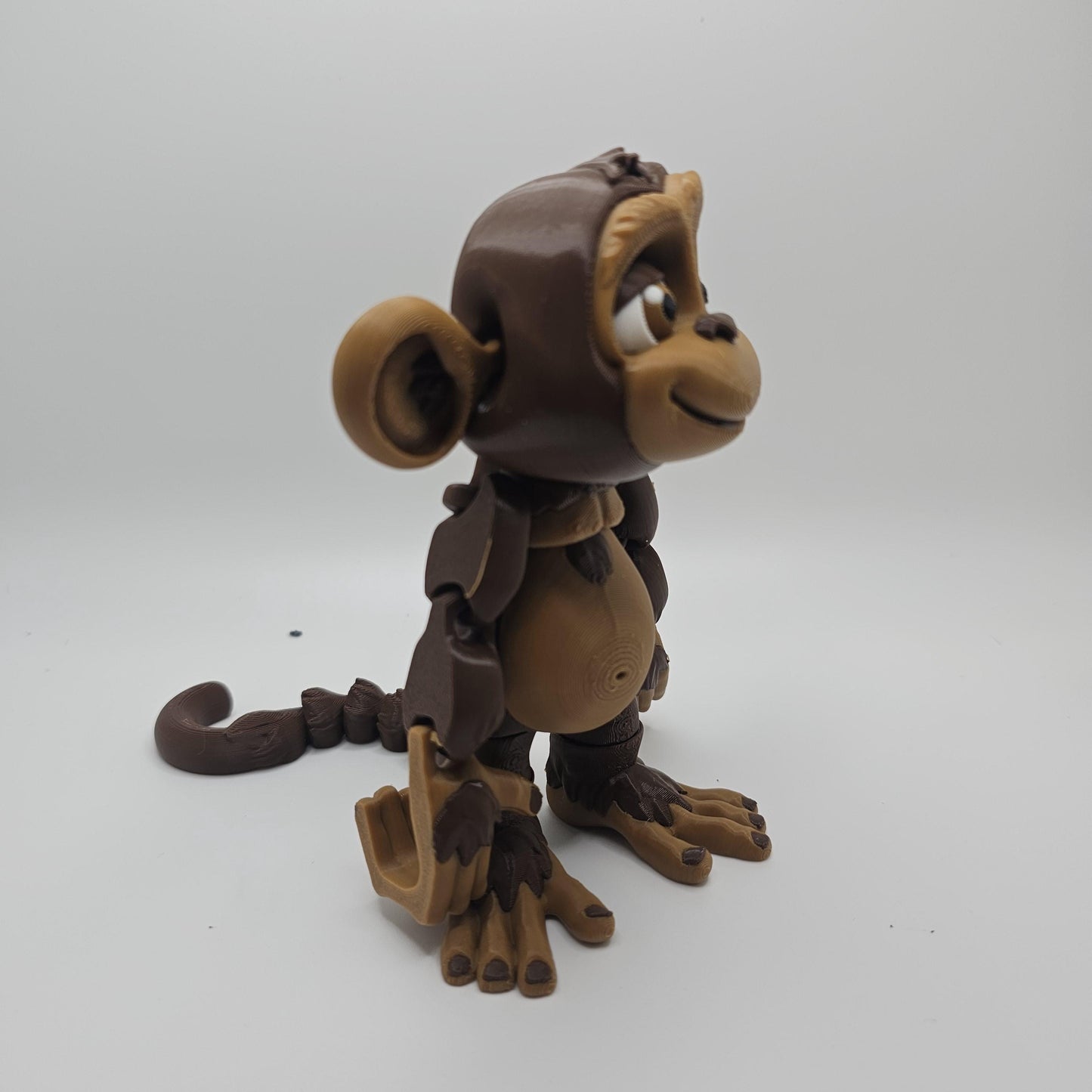3D Printed Articulated Monkey – Hangs by Hands or Tail – Designed by FrexiFactory