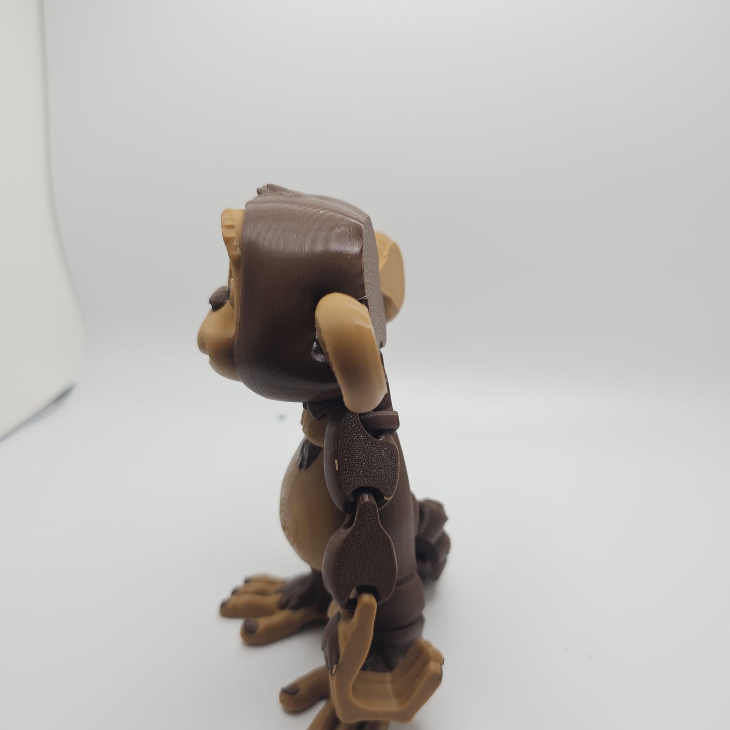 3D Printed Articulated Monkey – Hangs by Hands or Tail – Designed by FrexiFactory