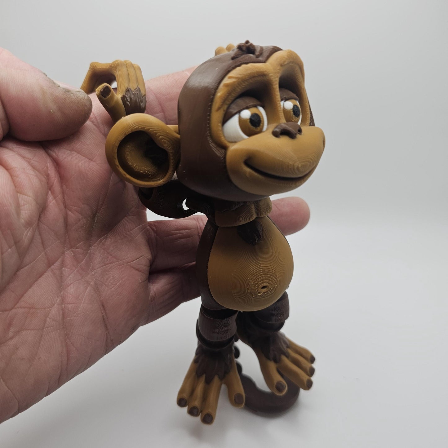 3D Printed Articulated Monkey – Hangs by Hands or Tail – Designed by FrexiFactory