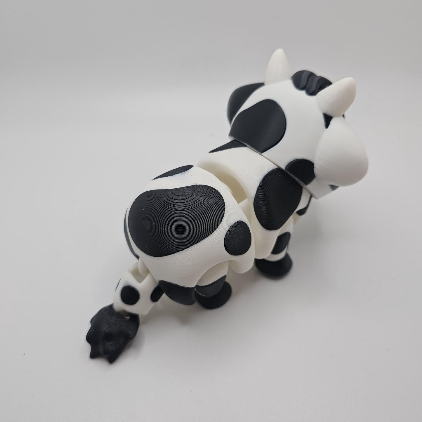 3D Printed Bright-Eyed Cow Figurine – Multiple Sizes & Colors