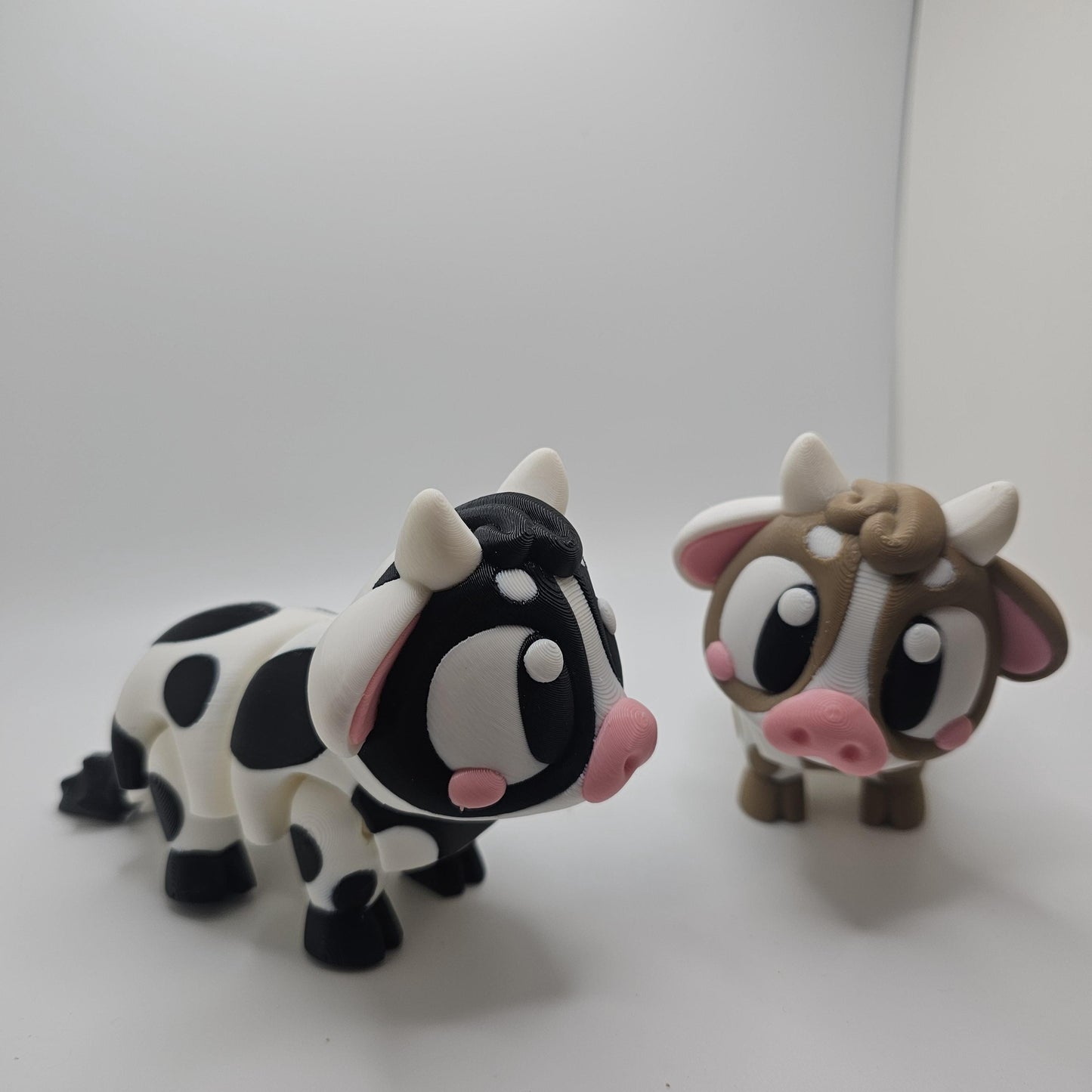 3D Printed Bright-Eyed Cow Figurine – Multiple Sizes & Colors